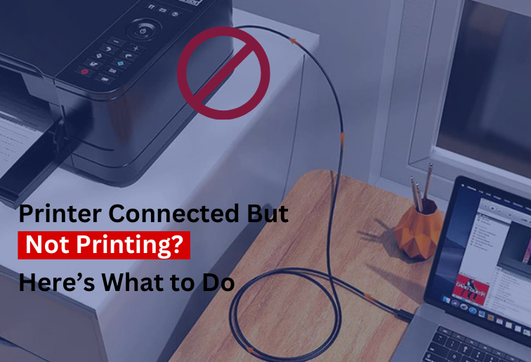 The image shows a transparent blue filter and a black printer kept on a table which is connected by a cable to the laptop which is kept on a table which has a pens kept in a holder. The image is titled- Printer Connected But Not Printing? Here's What to Do